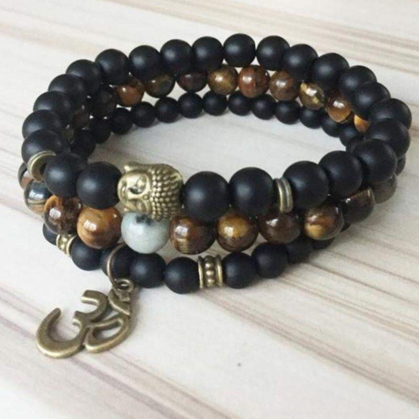 Buddha OM bracelets in matte black onyx and tiger eye