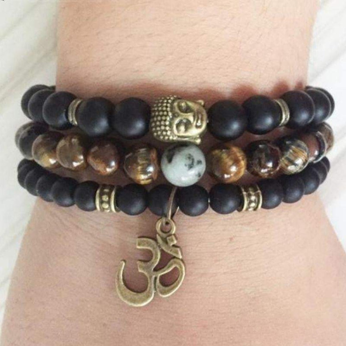 Buddha OM bracelets in matte black onyx and tiger eye