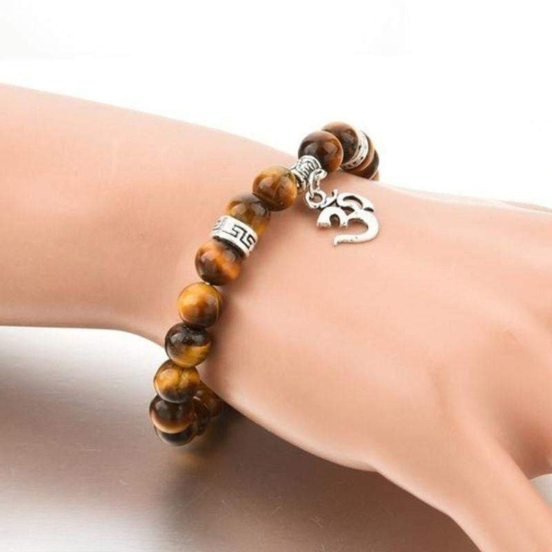 OM bracelet in tiger eye and silver