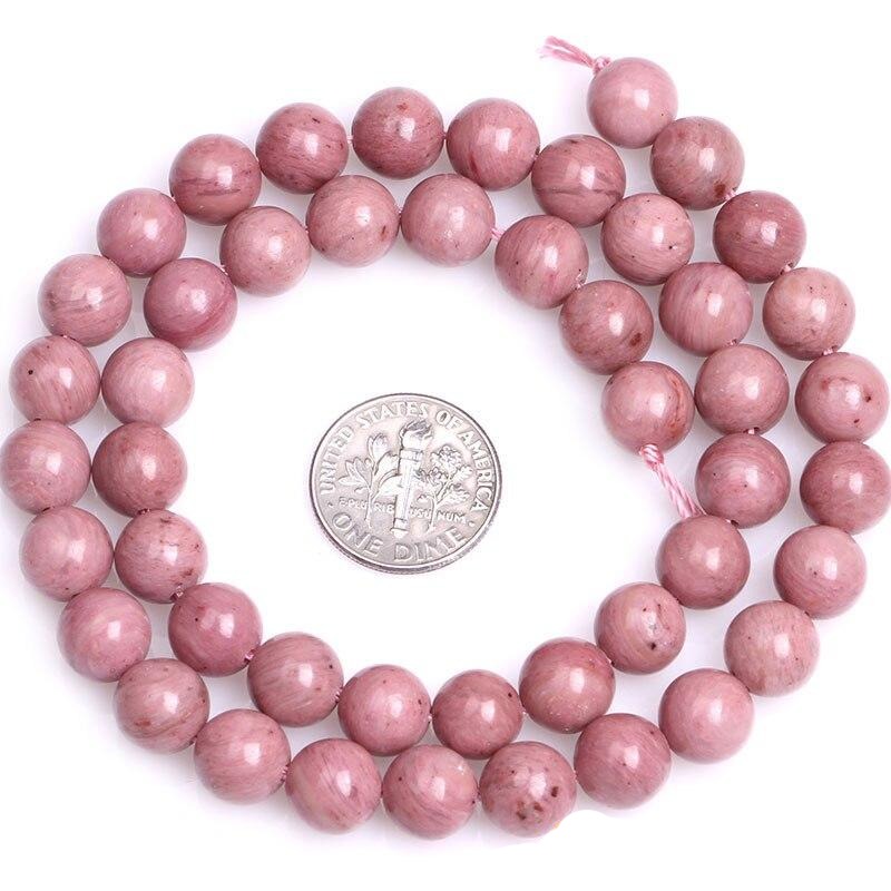 Round pink rhodonite beads