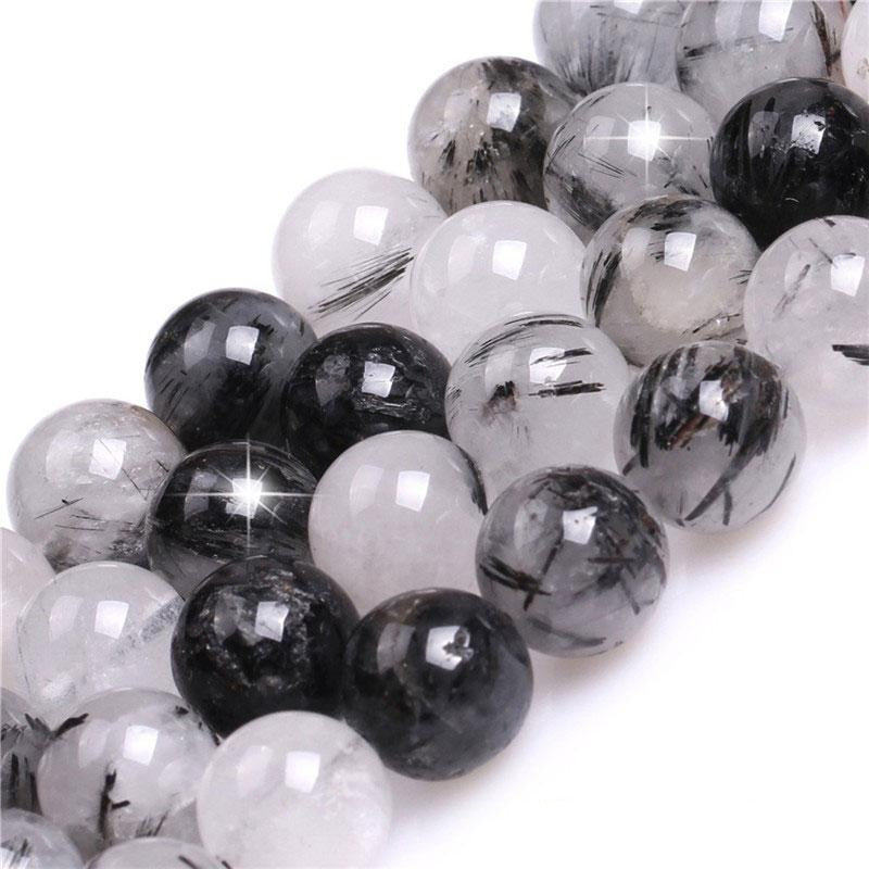 Round tourmalinated quartz beads