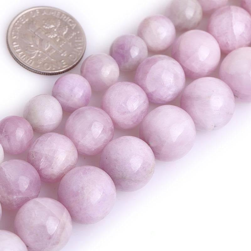 Round kunzite beads