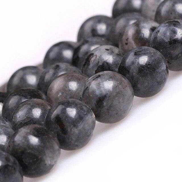 Round larvikite beads