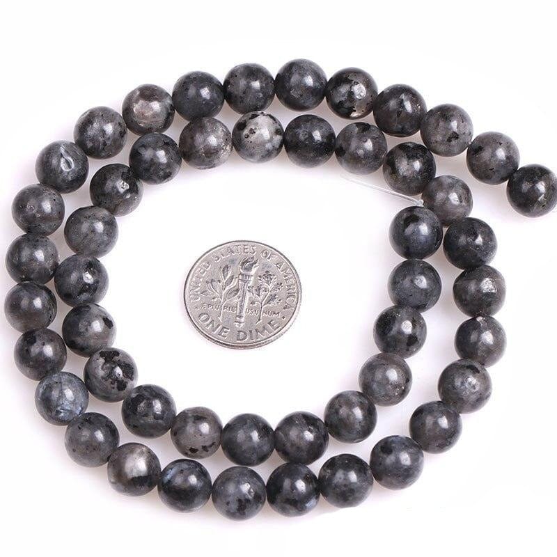 Round larvikite beads